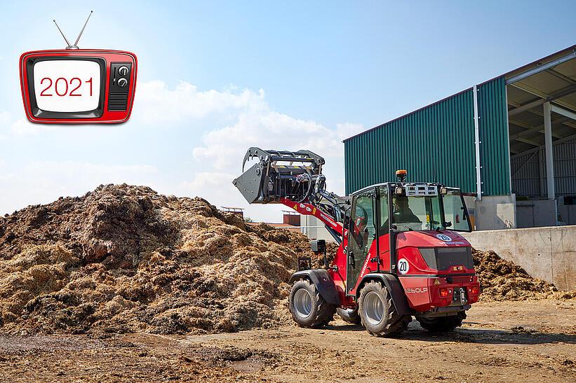 Weidemann Hoftrac 1260LP mit Kabine und Greifschaufel im landwirtschaftlichen Einsatz