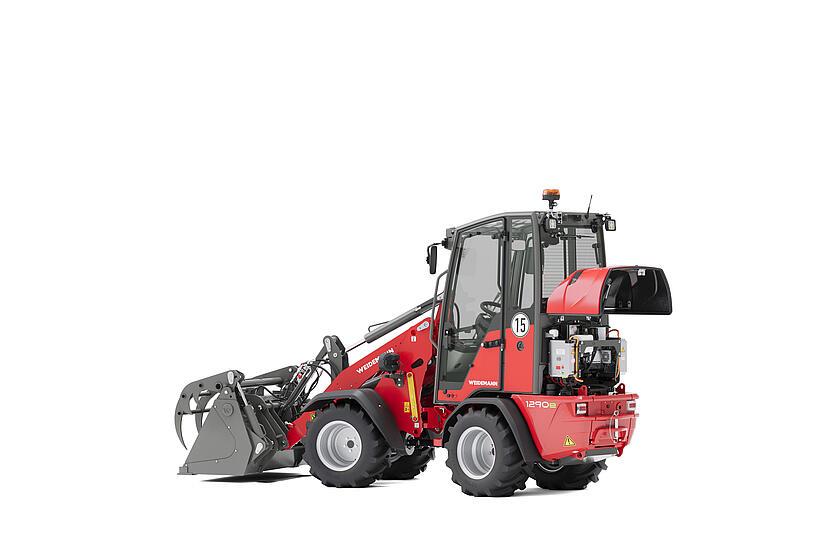 Weidemann Hoftrac 1290e mit Greifschaufel im Studio mit Motorhaube offen
