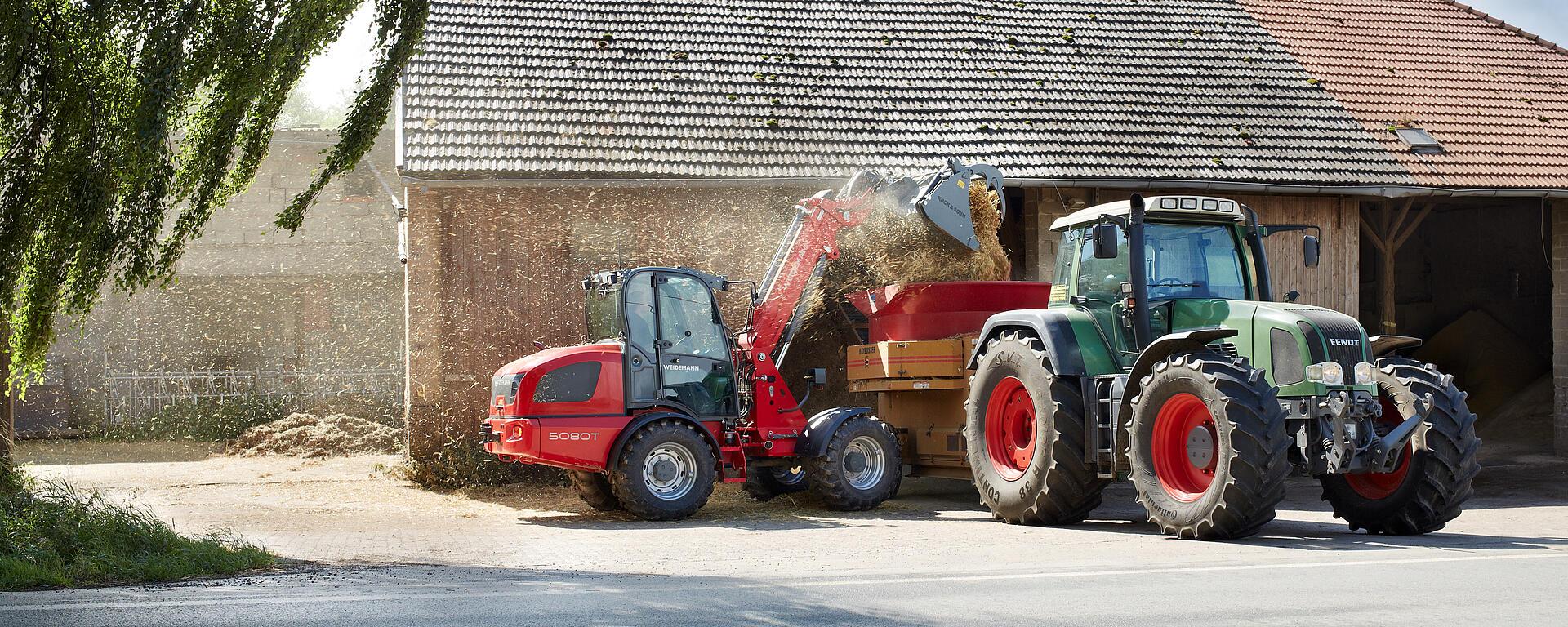 Weidemann telescopic wheel loader 5080T cabin with power grab bucket in action